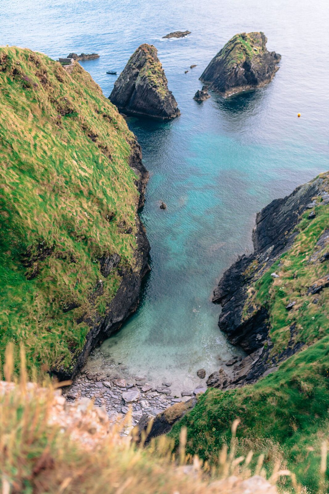 Dramatic, moody ocean views at the iconic Dun Chaoin cliffs, captured by an international destination photographer.